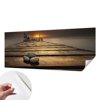 Stick-on wall mural with a sunset design