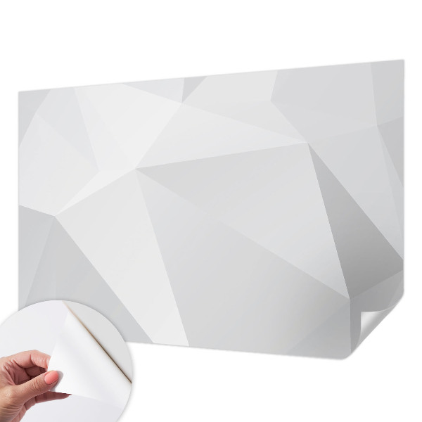 Removable wall mural with a gray triangle pattern