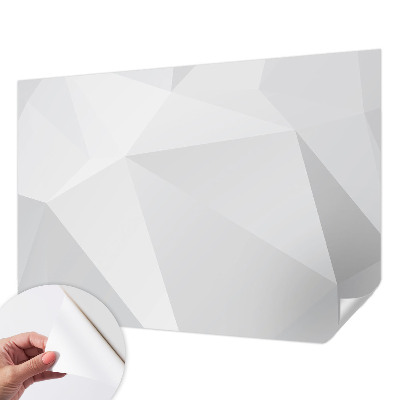 Removable wall mural with a gray triangle pattern