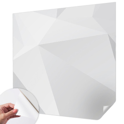 Removable wall mural with a gray triangle pattern