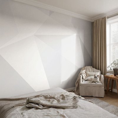 Removable wall mural with a gray triangle pattern