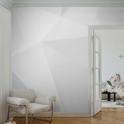 Removable wall mural with a gray triangle pattern