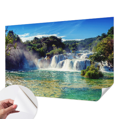 Nursery wall mural with a waterfall landscape design