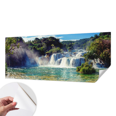 Nursery wall mural with a waterfall landscape design