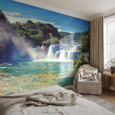 Nursery wall mural with a waterfall landscape design
