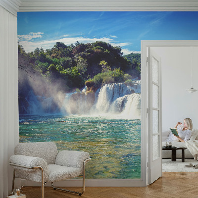 Nursery wall mural with a waterfall landscape design