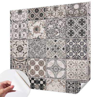 Self-adhesive wall mural featuring tile patterns