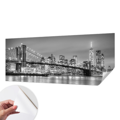 Removable wall mural with a metropolis bridge design