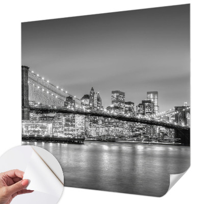 Removable wall mural with a metropolis bridge design