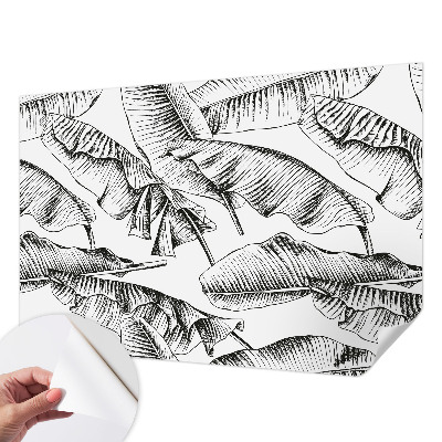 Stick-on wall mural with a banana leaves design