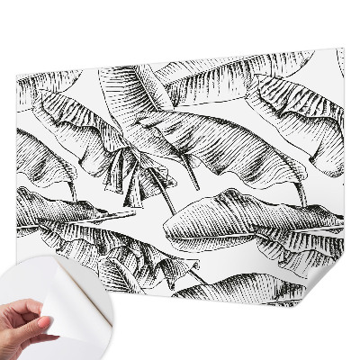 Stick-on wall mural with a banana leaves design