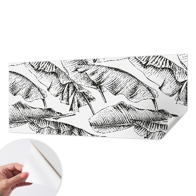 Stick-on wall mural with a banana leaves design