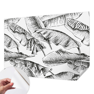 Stick-on wall mural with a banana leaves design