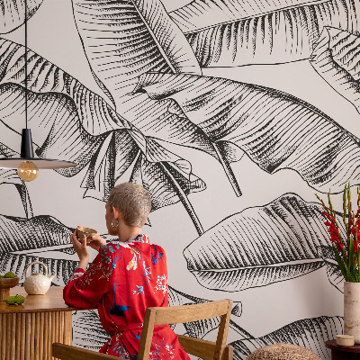 Stick-on wall mural with a banana leaves design