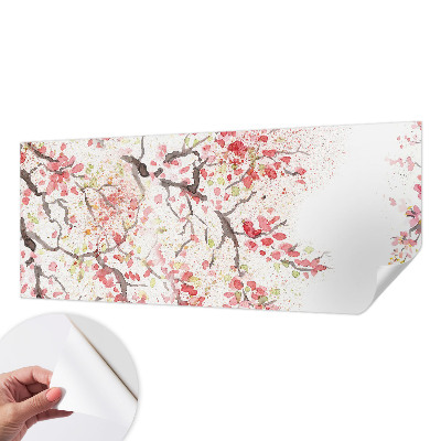 Peel and stick wallpaper mural with a design of flowering branches