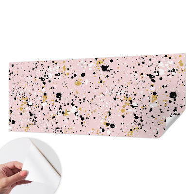 Self-adhesive wall mural with an artistic spotted pattern