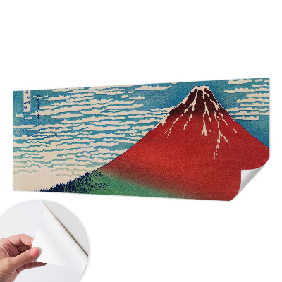 Peel and stick wall mural with a red mountain design