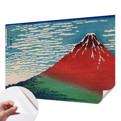 Peel and stick wall mural with a red mountain design
