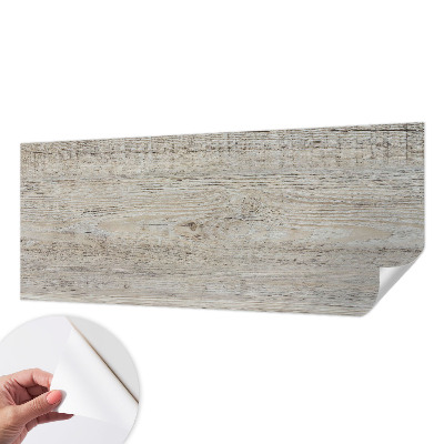 Nursery wall mural with a wooden rings design