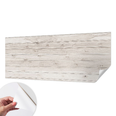 Peel and stick wallpaper mural with a natural wood design