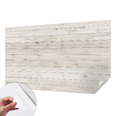 Peel and stick wallpaper mural with a natural wood design
