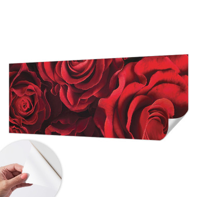 Peel and stick wall mural with a red rose design
