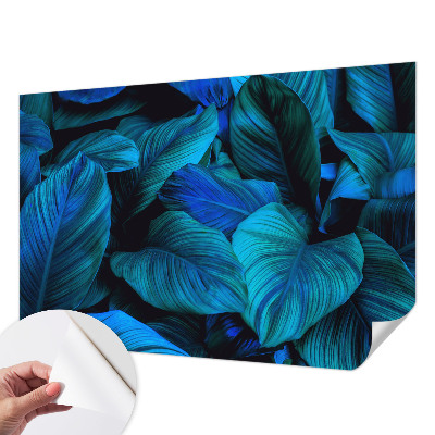 Stick-on wall mural with a blue leaves pattern