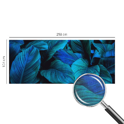 Stick-on wall mural with a blue leaves pattern