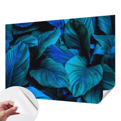 Stick-on wall mural with a blue leaves pattern