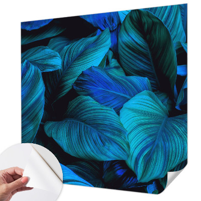 Stick-on wall mural with a blue leaves pattern