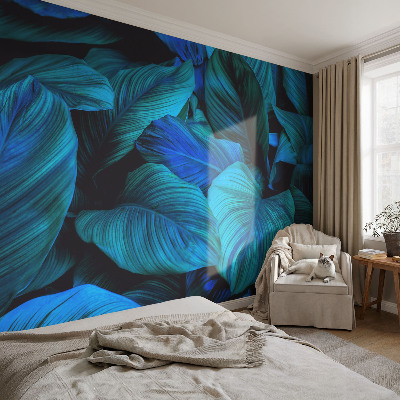Stick-on wall mural with a blue leaves pattern