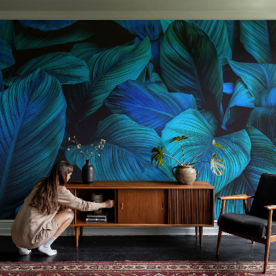 Stick-on wall mural with a blue leaves pattern