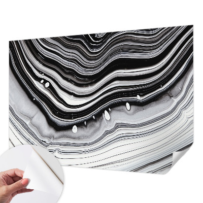 Self-adhesive wall mural with an optical waves design
