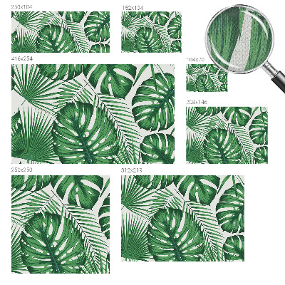 Removable wall mural with a tropical leaves design