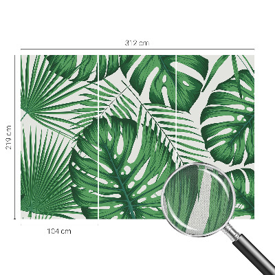 Removable wall mural with a tropical leaves design
