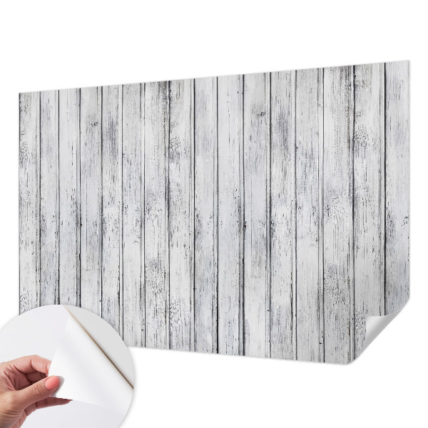 Removable wall mural with a wooden boards pattern