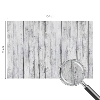 Removable wall mural with a wooden boards pattern