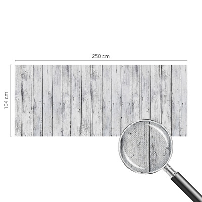 Removable wall mural with a wooden boards pattern