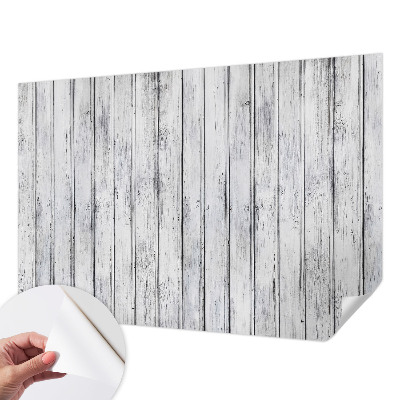 Removable wall mural with a wooden boards pattern