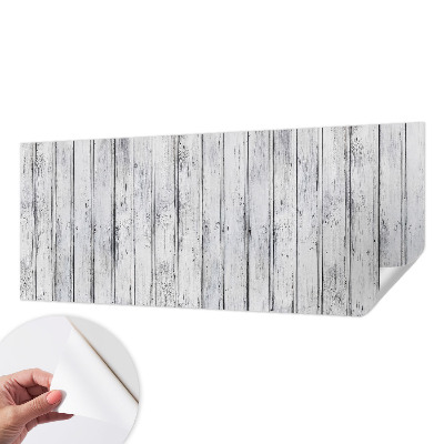 Removable wall mural with a wooden boards pattern