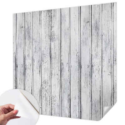 Removable wall mural with a wooden boards pattern