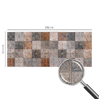 Nursery wall mural with an ornamental tile pattern