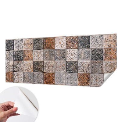 Nursery wall mural with an ornamental tile pattern