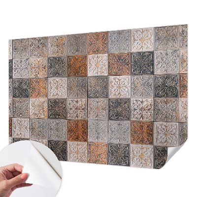 Nursery wall mural with an ornamental tile pattern