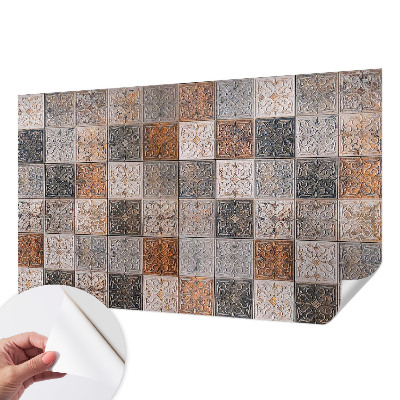 Nursery wall mural with an ornamental tile pattern