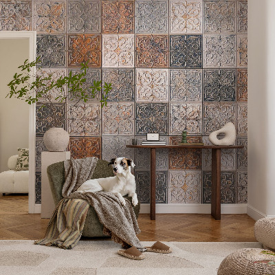 Nursery wall mural with an ornamental tile pattern