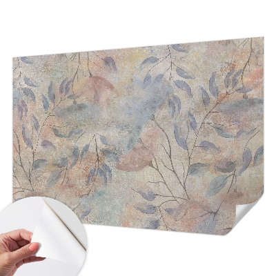 Removable wall mural with an abstract leaves design