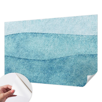 Peel and stick wallpaper mural with a blue waves design