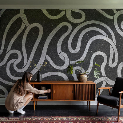 Peel and stick wall mural for living room with a twisted shapes design