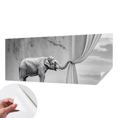 Peel and stick wall mural with a surrealist elephant design